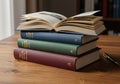 A stack of three hardbound books with textured covers, colored Royalty Free Stock Photo