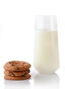 Stack of three homemade chocolate chip cookies and glass of milk Royalty Free Stock Photo