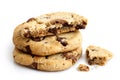 Stack of three light chocolate chip cookies isolated. One broken Royalty Free Stock Photo