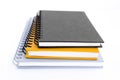 Stack of three notebooks or copybooks on white background Royalty Free Stock Photo