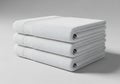 Stack of three plush white bath towels neatly folded ready for use Royalty Free Stock Photo