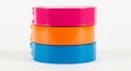 Stack Of Three Rolls Of Colored Duct Tape Pink Orange Blue On White image photo Royalty Free Stock Photo