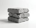 Stack of three rough grey concrete paving stones on white background. Construction material for building pathways patios or Royalty Free Stock Photo