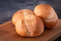 Stack of three small loaves of sourdough bread