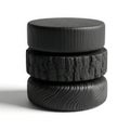 Stack of three unique black circular objects Royalty Free Stock Photo
