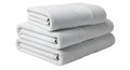 Stack of Three White Bath Towels Royalty Free Stock Photo