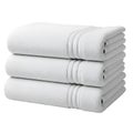 Stack of Three White Bath Towels Royalty Free Stock Photo
