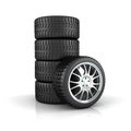 Stack of tires with alloy wheels Royalty Free Stock Photo