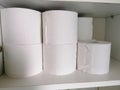 Stack of toilet paper in a shelf Royalty Free Stock Photo