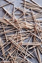 Stack of toothpicks on grunge background. Royalty Free Stock Photo