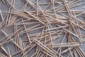 Stack of toothpicks on grunge background. Royalty Free Stock Photo