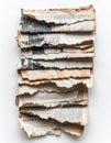 Stack of Torn Newspaper Sheets with Headlines on White Background Close Up Royalty Free Stock Photo