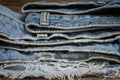 Stack of torn and worn old jean