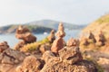 Stack tower stone zen art folded blurred rock background. large small ascending stone cobblestone tower. Royalty Free Stock Photo