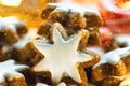 Stack of Traditional German Christmas Cookies Home Baked Glazed Cinnamon Stars Sparkling Garland Lights Candle Candy Canes Festive Royalty Free Stock Photo