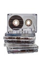 Stack of transparent vintage audio cassette tapes isolated on a white back Royalty Free Stock Photo