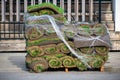 Stack of turf grass rolls, small rolls of sod on pallet is ready for pick up and installation Royalty Free Stock Photo