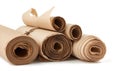 Stack of twisted rolls of brown paper isolated on white background Royalty Free Stock Photo