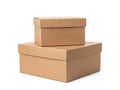 Stack of two brown cardboard boxes on white background Royalty Free Stock Photo