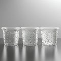A stack of two clear plastic storage containers arranged on a reflective surface Royalty Free Stock Photo