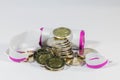 Stack of two euro coins minted in Spain on a white background