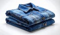Stack of two folded blue denim shirts with buttons and collar on white surface Royalty Free Stock Photo