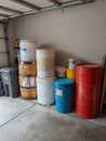 Stack of Unlabeled Containers Stored in a Garage With Clear Left Margin for Access and Organization Royalty Free Stock Photo