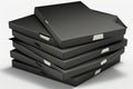 stack of unopened pizza boxes black on a black background Royalty Free Stock Photo