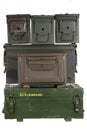 Stack of US army ammo cans and army green crate Royalty Free Stock Photo