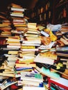 stack of used books and stacked in a messy way
