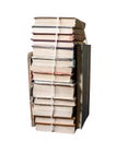 Stack of used books tied with packthread isolated