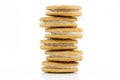 Stack of vanilla cookies with cream filling on white background Royalty Free Stock Photo