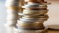 A stack of various coins made from metals like copper silver and Royalty Free Stock Photo
