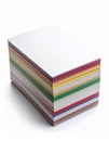 Stack of Various Colored Paper Sheets on White Background Studio Shot Royalty Free Stock Photo