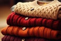 Stack of various colorful knitted warm sweaters. Generative AI