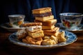 stack of various homemade biscuits on a plate