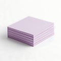 Stack of vibrant pink paper sheets on a light background Royalty Free Stock Photo