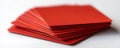 Stack of vibrant red business cards on a white background. Concept Product Photography, Business Cards, Vibrant Colors, White Royalty Free Stock Photo