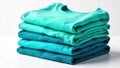 Stack of vibrantly colored t shirts, artfully arranged with slight offsets, demonstrating color palette. A visually appealing Royalty Free Stock Photo