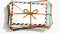 Stack of Vintage Airmail Envelopes Tied with Twine on White Background Royalty Free Stock Photo