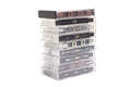 Stack of vintage audio cassettes isolated on white. Royalty Free Stock Photo