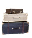 Stack of a vintage leather various color suitcases