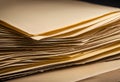 stack of vintage paper sheets on a wooden surface Royalty Free Stock Photo
