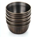 A stack of vintagestyle metal bowls Royalty Free Stock Photo