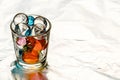 The stack for vodka is filled with hydrogel balls of different colors Royalty Free Stock Photo