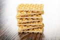 Stack of wafers on wooden table Royalty Free Stock Photo
