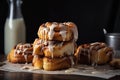 stack of warm, gooey cinnamon buns with drizzle of icing