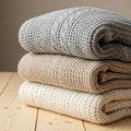 Stack of Warm Knitted Sweaters in Neutral Tones Royalty Free Stock Photo