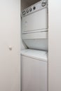 Stack washer and dryer for small condominium or apartment closets