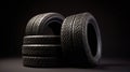 Stack of wheel new black tyres for winter car driving isolated on black background, generative ai Royalty Free Stock Photo